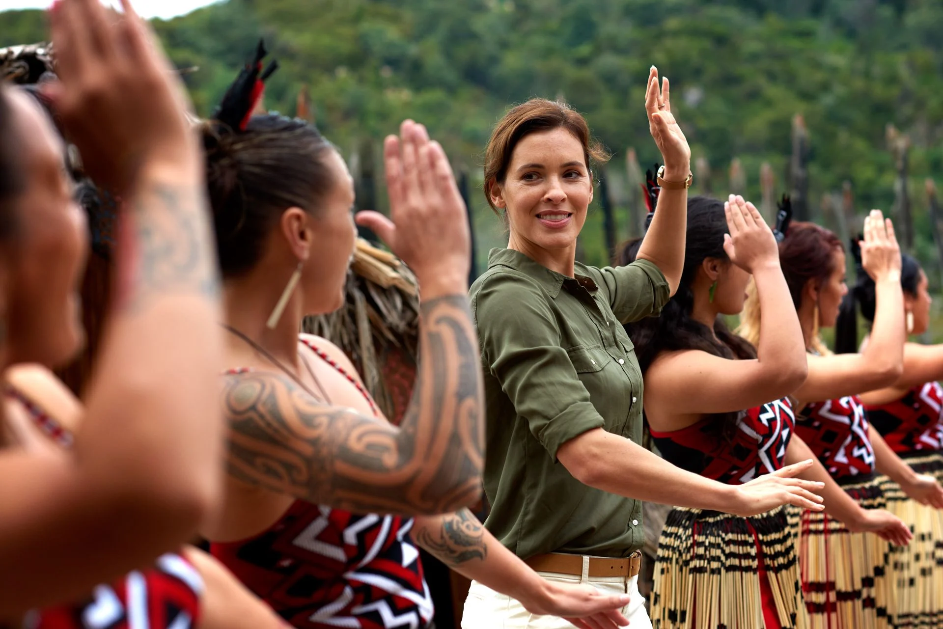 Woman learning Maori Traditional Dance